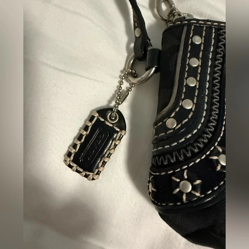 Coach Rare NWOT Studded and Embroidered Black and Cream Patterned Wristlet!